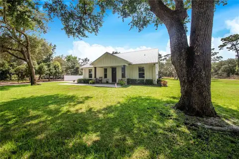 12510 LAKE HATCHINEHA RD — home for sale