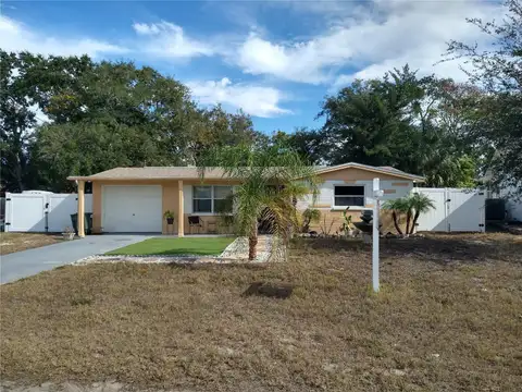 12910 COLLEGE HILL DR — home for sale