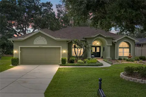 12215 WOODLANDS CIR — home for sale