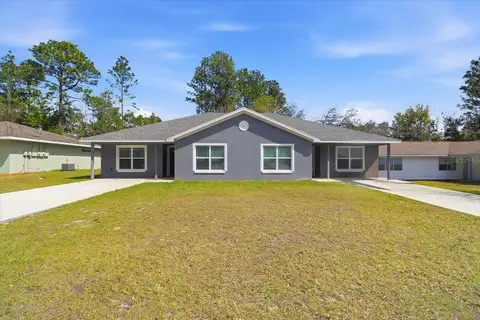 9371/9373 N PEACHTREE WAY — home for sale