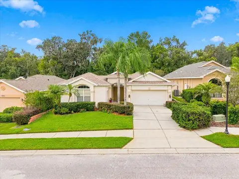 12220 WOODLANDS CIR — home for sale