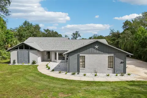 5803 SPRUCE CREEK WOODS DR — home for sale