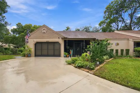 6694 PIN OAK CT — home for sale